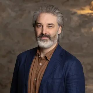 Dr. Calum T. M. Nicholson